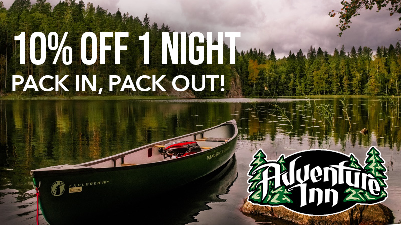 Canoe on lake with Adventure Inn offer