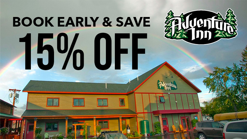 Adventure Inn with rainbow and discount offer.